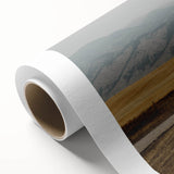 Art deco-style Montana landscape on rolled canvas, featuring muted earth tones, ideal for nursery wall art.