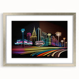Textured abstract art print of Las Vegas skyline in muted gray tones, framed in silver, ideal for bedroom art.