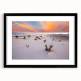 Extra large abstract art print of a colorful New Mexico landscape on textured canvas, framed in black.