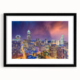 Extra large abstract art print of colorful, textured Charlotte skyline on a framed canvas, ideal for living room decor.