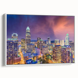 Vintage poster art of Charlotte, North Carolina skyline in vibrant colors on a large framed canvas.
