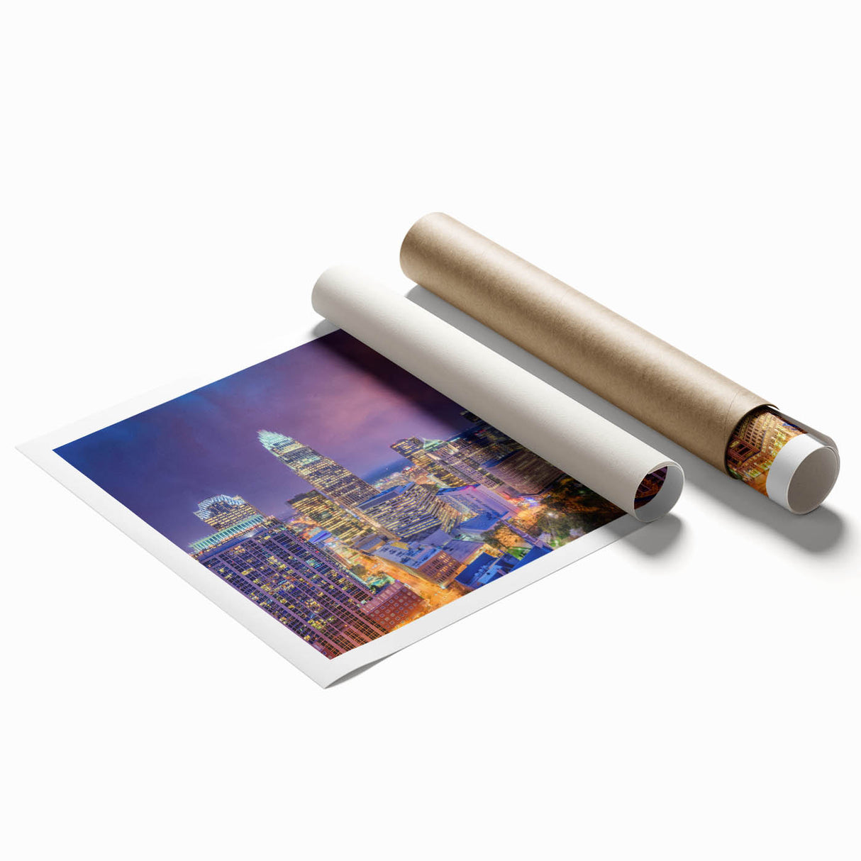 Rolled print of Charlotte, North Carolina skyline in muted blue and gray tones.