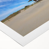 Art deco poster featuring Outer Banks, North Carolina scenery in muted blue and sandy tones on rolled canvas.