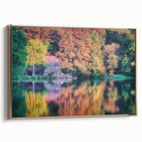 Framed canvas wall art featuring a vintage-style landscape of Raleigh, North Carolina, with muted earth tones.