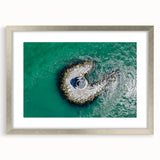 Textured abstract art print of Long Island scenery in muted earth tones, framed in silver, ideal for bedroom wall decor.