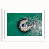 Abstract art print of Long Island featuring soft blue and white tones on a framed white mat, ideal for dining room decor.