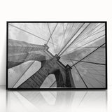 Large abstract wall art of the Brooklyn Bridge in muted black and gray tones, acrylic print, ideal for modern office decor.