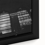 Close-up of a black framed canvas depicting Grand Central with colorful, textured art, ideal for living room decor.