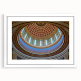 Abstract art print of Oklahoma scenery in muted earth tones on a framed white mat, suitable for dining room decor.