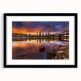 Abstract art print of vibrant, textured colors representing Portland's scenery on a large black-framed canvas.