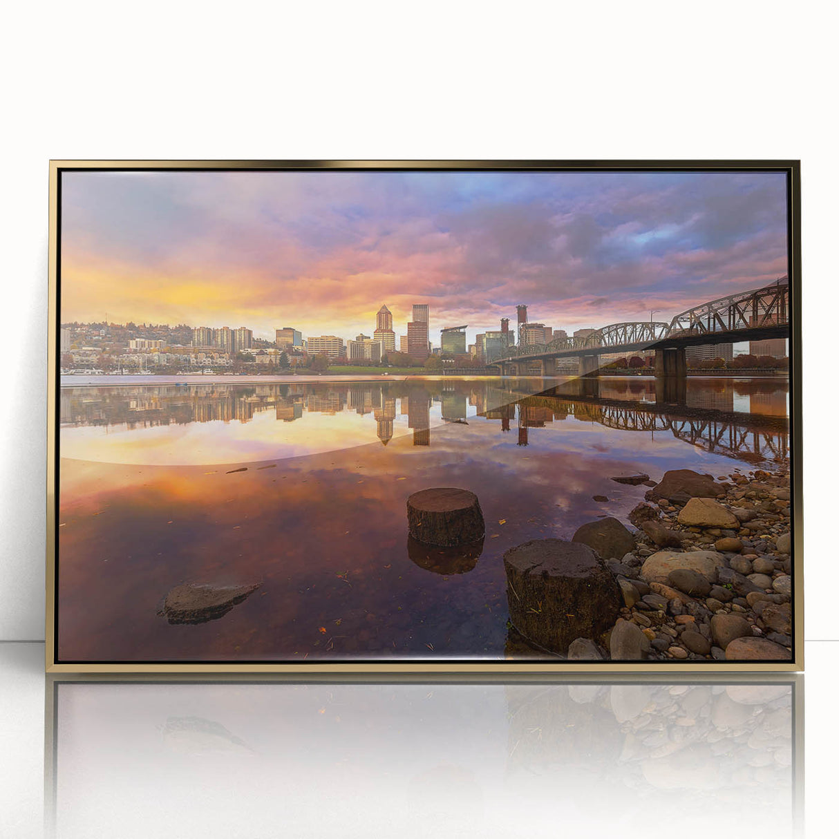 Large art print of Portland, Oregon skyline in gold and black tones on a framed acrylic.