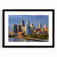 Extra large, textured abstract art print of colorful Philadelphia skyline, in a black frame with mat.