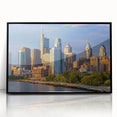 Large abstract wall art of Philadelphia skyline in muted gray tones on framed acrylic, ideal for modern living room decor.