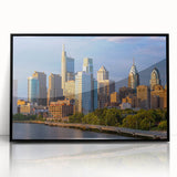 Large abstract wall art of Philadelphia skyline in muted gray tones on framed acrylic, ideal for modern living room decor.