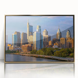 Mid-century modernist style Philadelphia skyline in gold and black hues on framed acrylic.