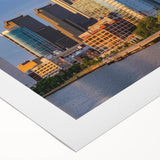 Art deco poster of Philadelphia skyline in muted blue and gold tones on rolled canvas, suitable for dining room decor.