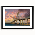 Colorful abstract art print of Charleston landscape, with textured details on a large black-framed canvas.