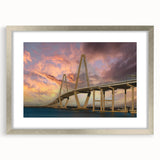 Textured abstract art print of Charleston scenery in muted gray and blue tones, framed in silver, ideal for bedroom decor.