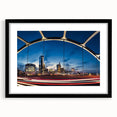Colorful abstract art print of Nashville skyline, in a black frame with mat, ideal for living room decor.
