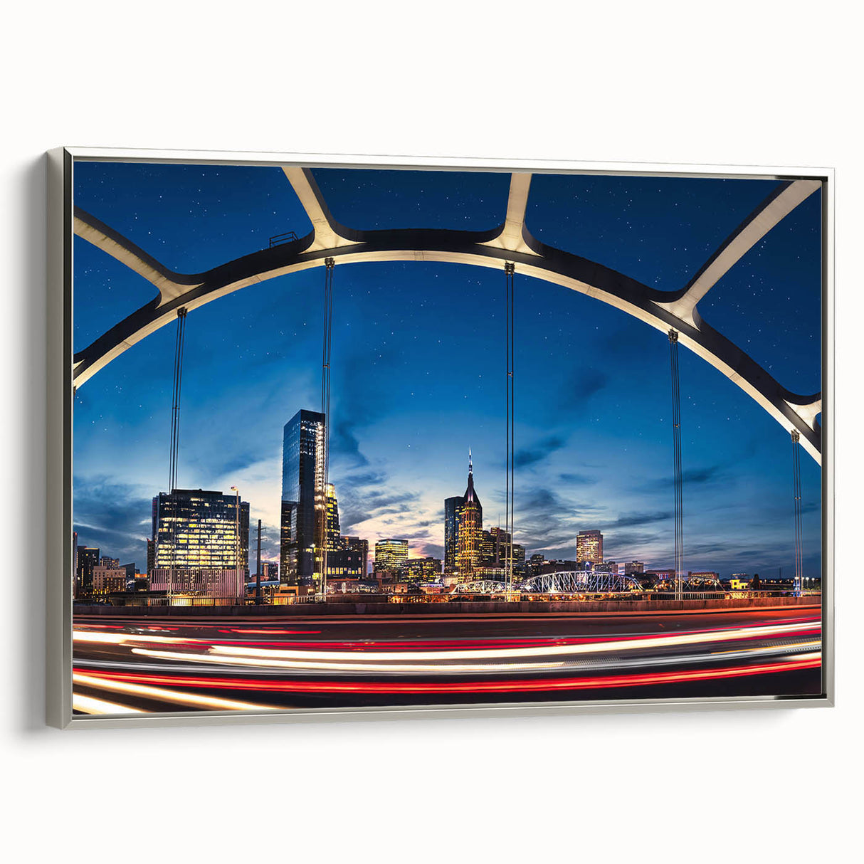 Framed canvas of a colorful Nashville landscape, featuring vintage poster art style and black wall accents.