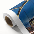 Art deco style poster of Nashville skyline in muted blue and gold tones on rolled canvas, ideal for nursery wall art.