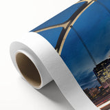 Art deco style poster of Nashville skyline in muted blue and gold tones on rolled canvas, ideal for nursery wall art.