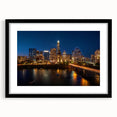 Extra large abstract art print of Austin skyline in vibrant colors on a textured canvas, framed in black.