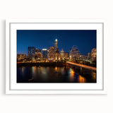 Abstract art print of Austin skyline in muted gray and blue tones on a framed white mat.