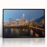 Large abstract wall art depicting the Austin, Texas skyline in muted gray and blue tones on a framed acrylic.