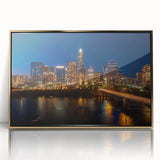 Large art print of Austin skyline in muted gold tones on acrylic, framed, mid-century modernist style.