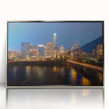 Mid-century modernist art depicting the Austin, Texas skyline in muted gray and blue tones on a framed acrylic print.