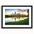 Extra large abstract art print of Dallas skyline in vibrant, colorful hues on a textured canvas, framed in black.