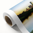 Art deco poster of Dallas skyline in muted blue and gray tones on rolled canvas.