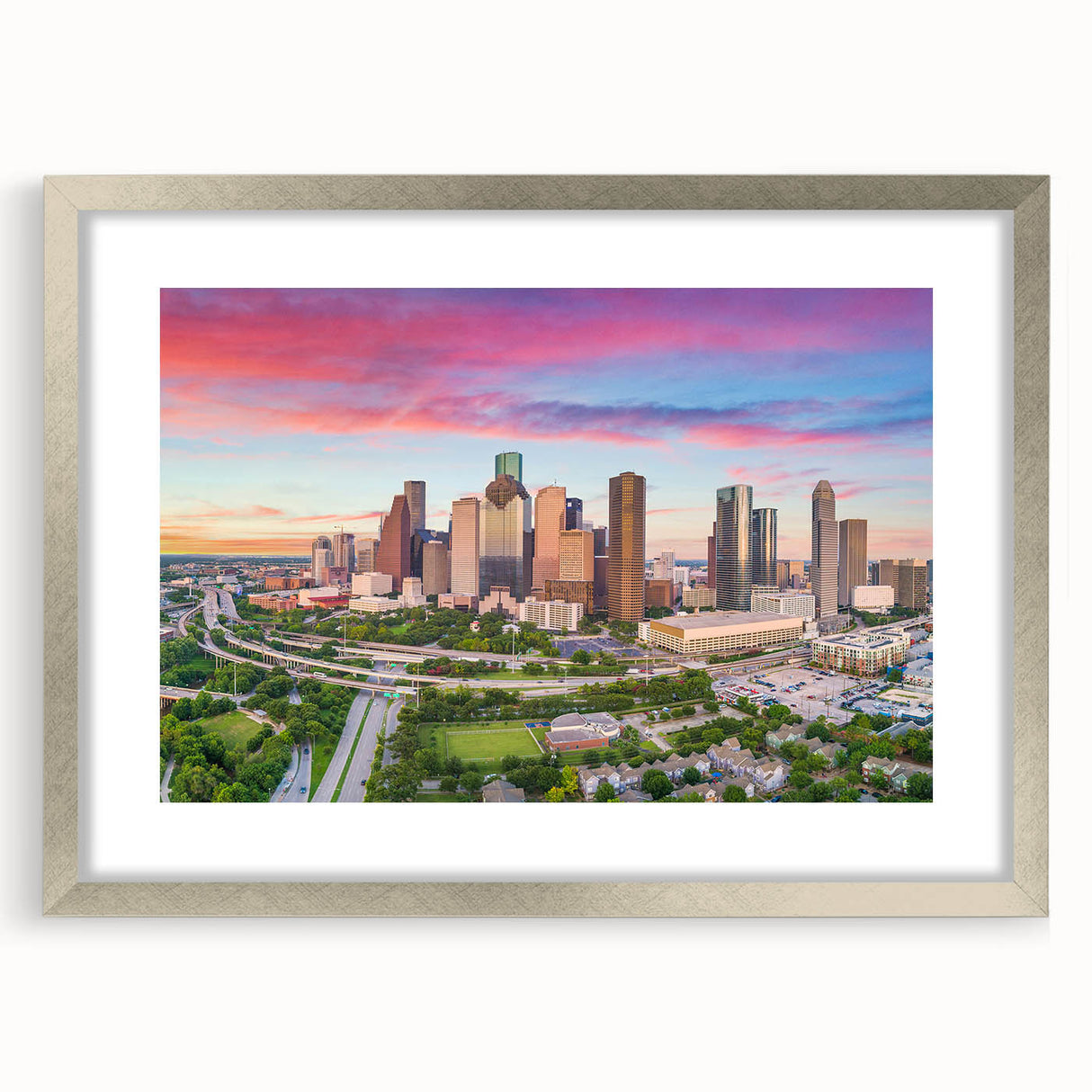 Textured art print of abstract Houston skyline in muted gray and blue tones on a silver-framed mat, ideal for bedroom art.