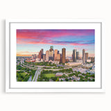 Abstract art print of Houston skyline in muted gray and blue tones on a white-framed mat, ideal for dining room decor.