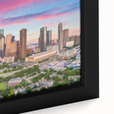 Framed canvas featuring a textured depiction of the Houston skyline in black with colorful accents.