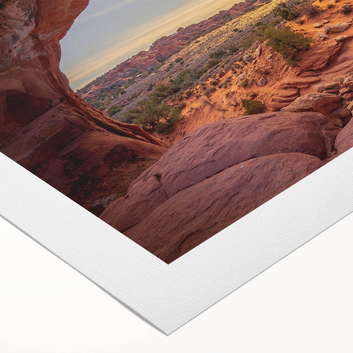 Art deco poster of Arches National Park in muted earth tones on rolled canvas, ideal for dining room wall art.