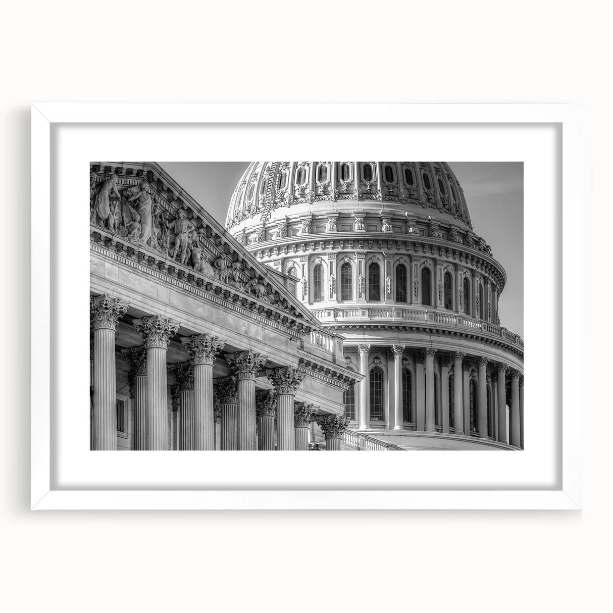 Abstract art print of the Washington DC Capitol in muted gray tones on a framed white mat, suitable for dining room decor.