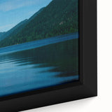 Black wall art featuring a textured representation of Olympic National Park in vibrant hues on a framed canvas.