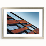 Textured abstract art print of Seattle skyline in muted gray tones on a silver-framed mat, ideal for bedroom art.