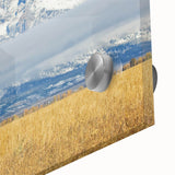 Large abstract depiction of the Grand Tetons in muted earth tones on acrylic glass, suitable for dining room art.