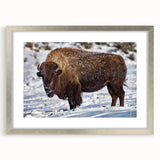 Textured art depicting abstract Yellowstone scenery in muted earth tones on a silver-framed mat, ideal for bedroom art.