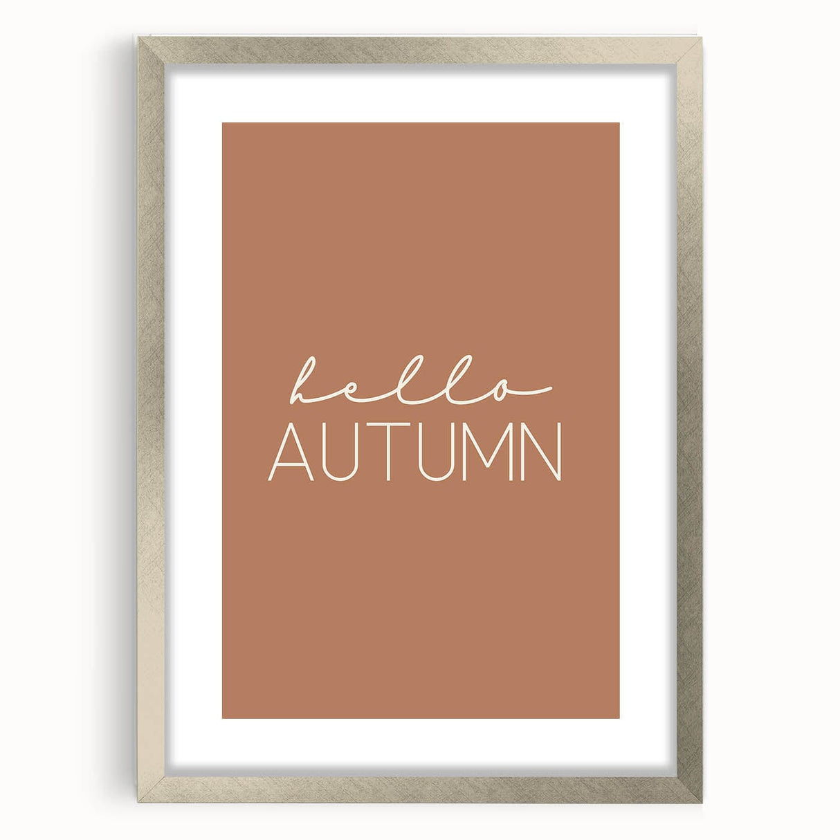Textured abstract art print depicting autumnal shades on a silver-framed canvas, suitable for enhancing a bedroom's decor.