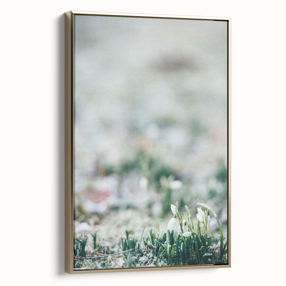 Framed canvas depicting a vintage-style landscape with spring motifs in muted gold and black, ideal for bedroom wall decor.