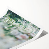 Extra large wall art featuring line art flowers in soft pastel shades on a rolled print.