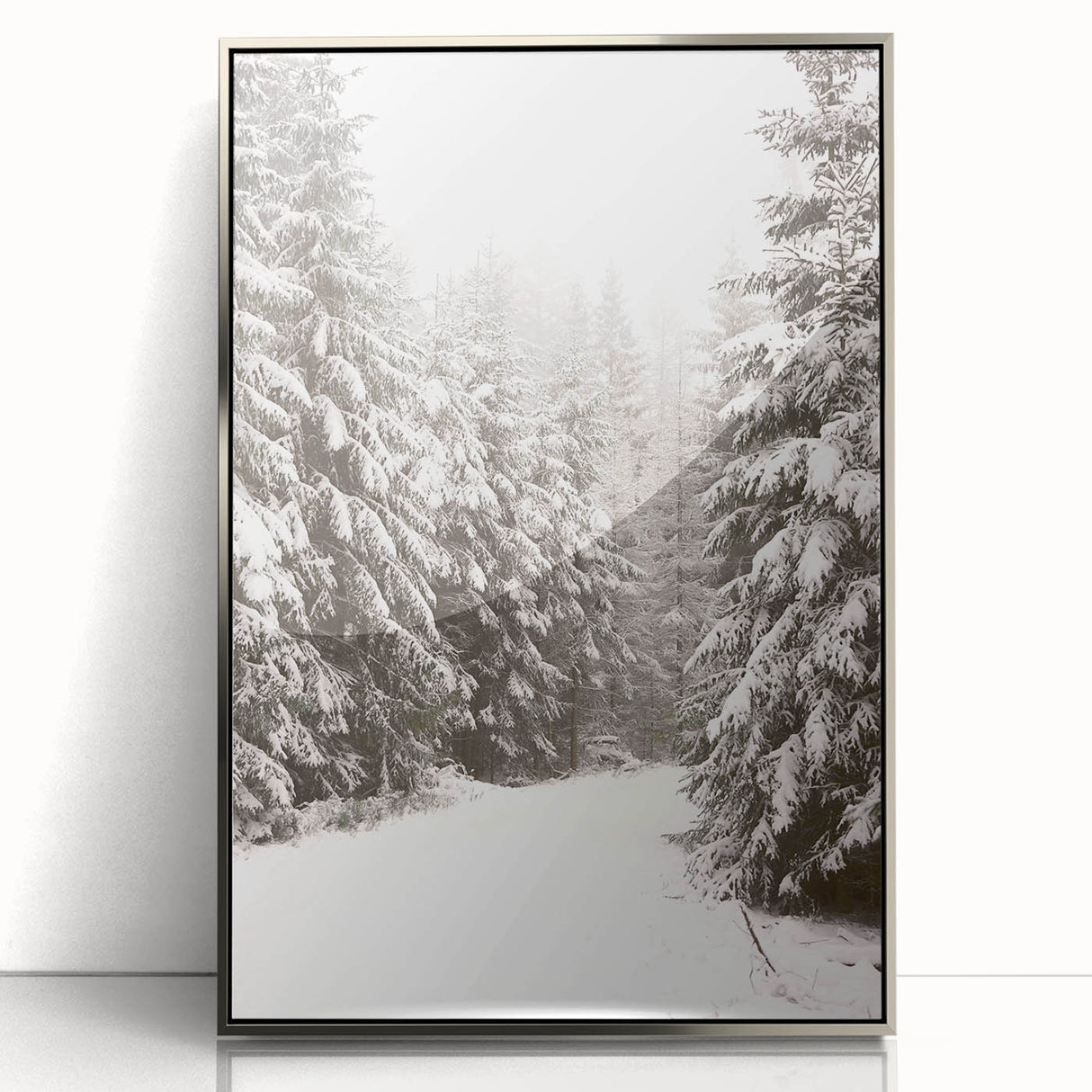 Mid-century modernist winter scene in muted blue and silver hues, acrylic print framed in silver.