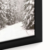 Extra large framed canvas featuring textured black wall art with colorful, abstract winter designs.
