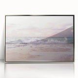 Mid-century modernist art depicting abstract shapes in pastel colors on a silver-framed acrylic print.