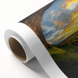 Rolled canvas artwork showcasing vibrant landscapes and caves, featuring rich colors and intricate details, elegantly packaged in a protective cardboard tube for easy transport. Ideal for home decor enthusiasts and nature lovers.