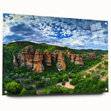 Acrylic glass artwork depicting a vibrant landscape of cliffs in rich colors, set against a side view with decorative pins, ideal for modern home decor.
